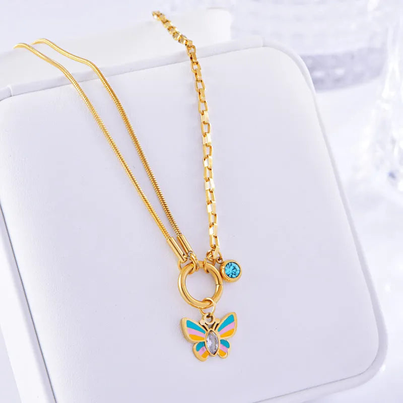 Gold-plated epoxy butterfly necklace and bracelet set with titanium steel construction and snake bone chain links