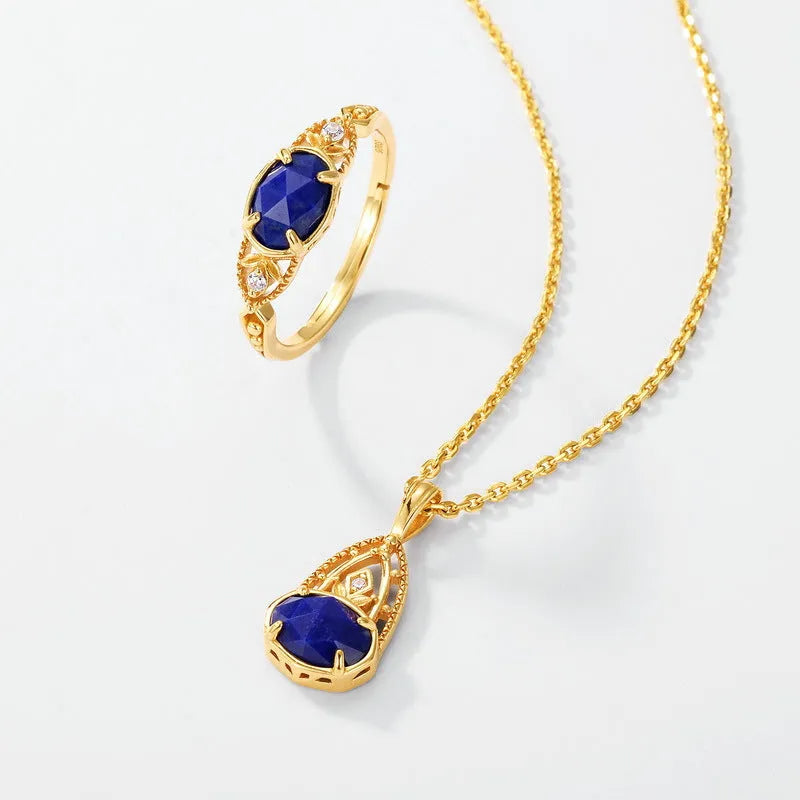 Japanese style silver lapis lazuli ring with elliptical geometric design and round stone centre