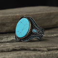 Men's antique silver alloy ring with turquoise stone in round band design