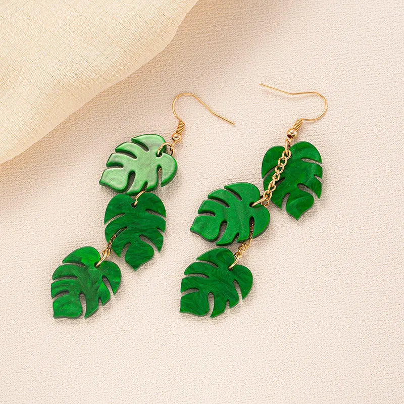 Jackfruit-shaped dangle earrings in acrylic and alloy, shown in one of five colour styles.