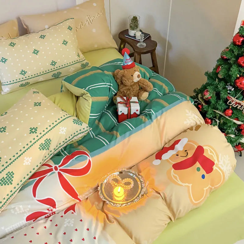 Cartoon printed Christmas bedding four-piece set including sheet, duvet cover and pillowcases.