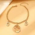 Spiral donut jewellery set showing necklace, bracelet, and ear hooks in gold or silver tone alloy