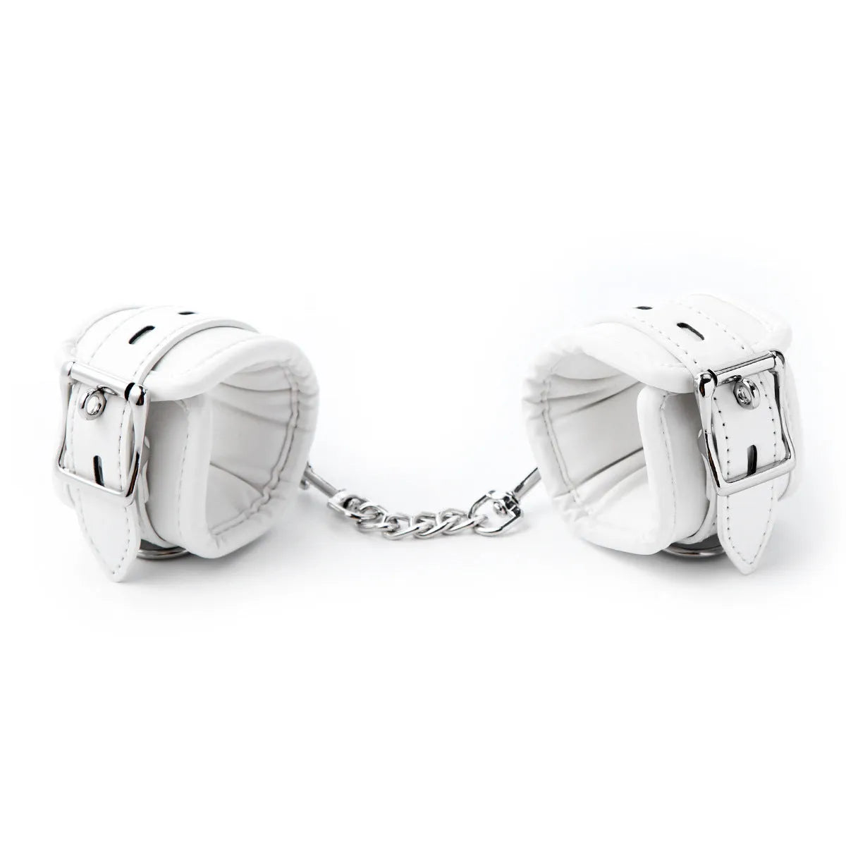 White PU sponge bondage set showing soft handcuffs, ankle cuffs, and a neck scarf laid out.