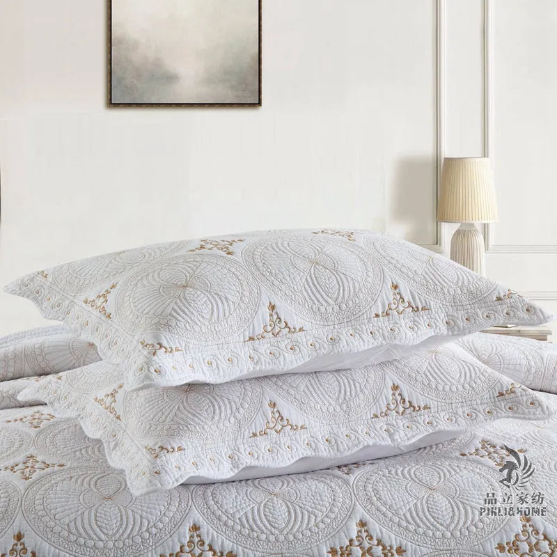 Pure cotton European-style embroidered bed cover set with two pillowcases on a 1.8m bed.