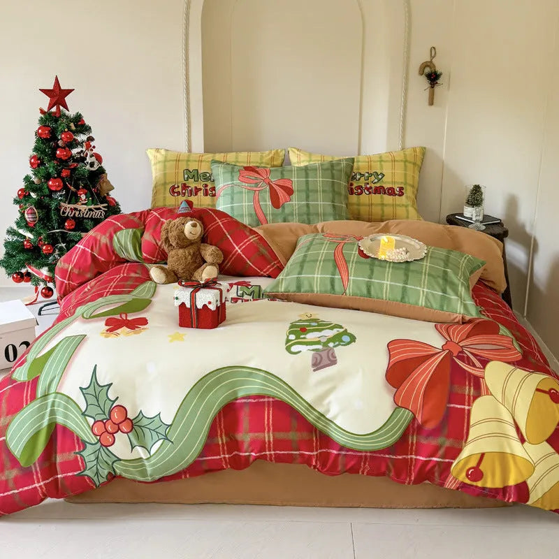 Cartoon printed Christmas bedding four-piece set including sheet, duvet cover and pillowcases.