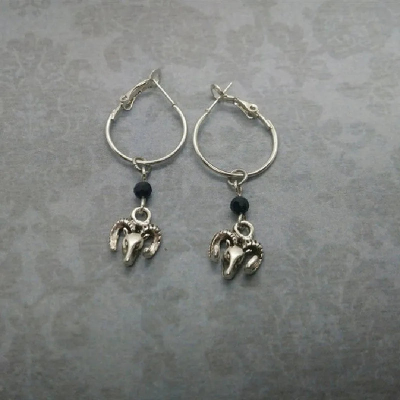 Silver round ring earrings for women with Tibetan antelope style design.