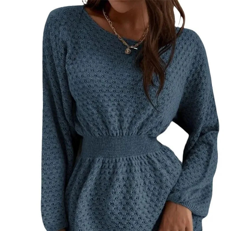 Blue women's knitted dress with crocheted flower details, round neck, fitted waist, and long sleeves.