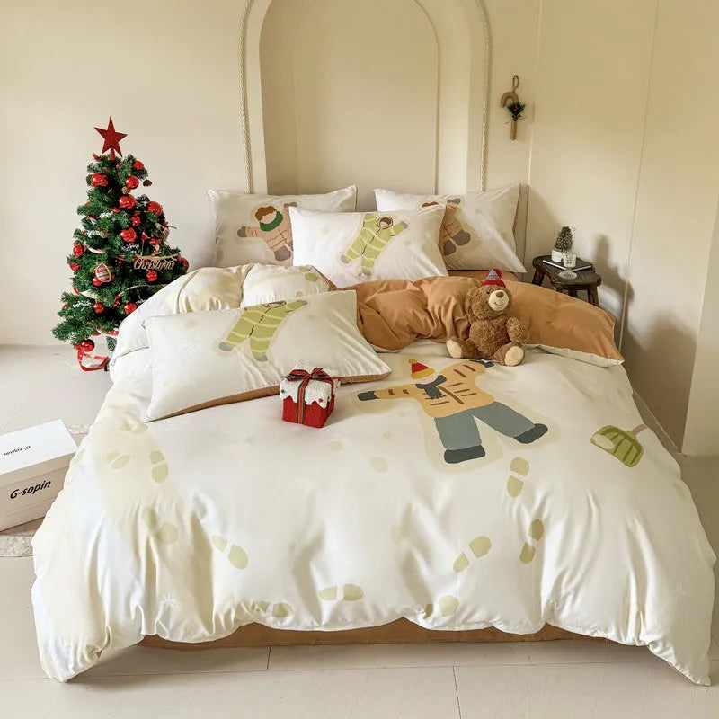 Cartoon printed Christmas bedding four-piece set including sheet, duvet cover and pillowcases.