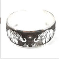 Ethnic Miao style carved open silver tone alloy bracelet with Roman shape design