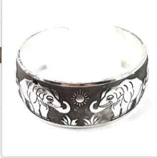 Ethnic Miao style carved open silver tone alloy bracelet with Roman shape design