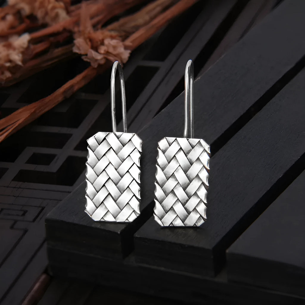 Silver geometric earrings with woven diamond plaid pattern, 17.5mm x 11mm dimensions