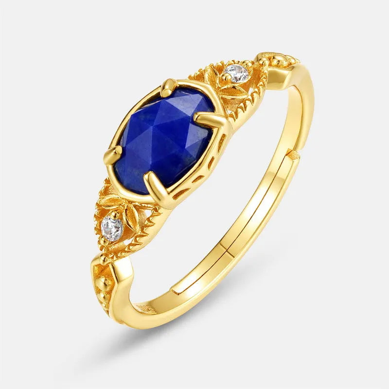 Japanese style silver lapis lazuli ring with elliptical geometric design and round stone centre