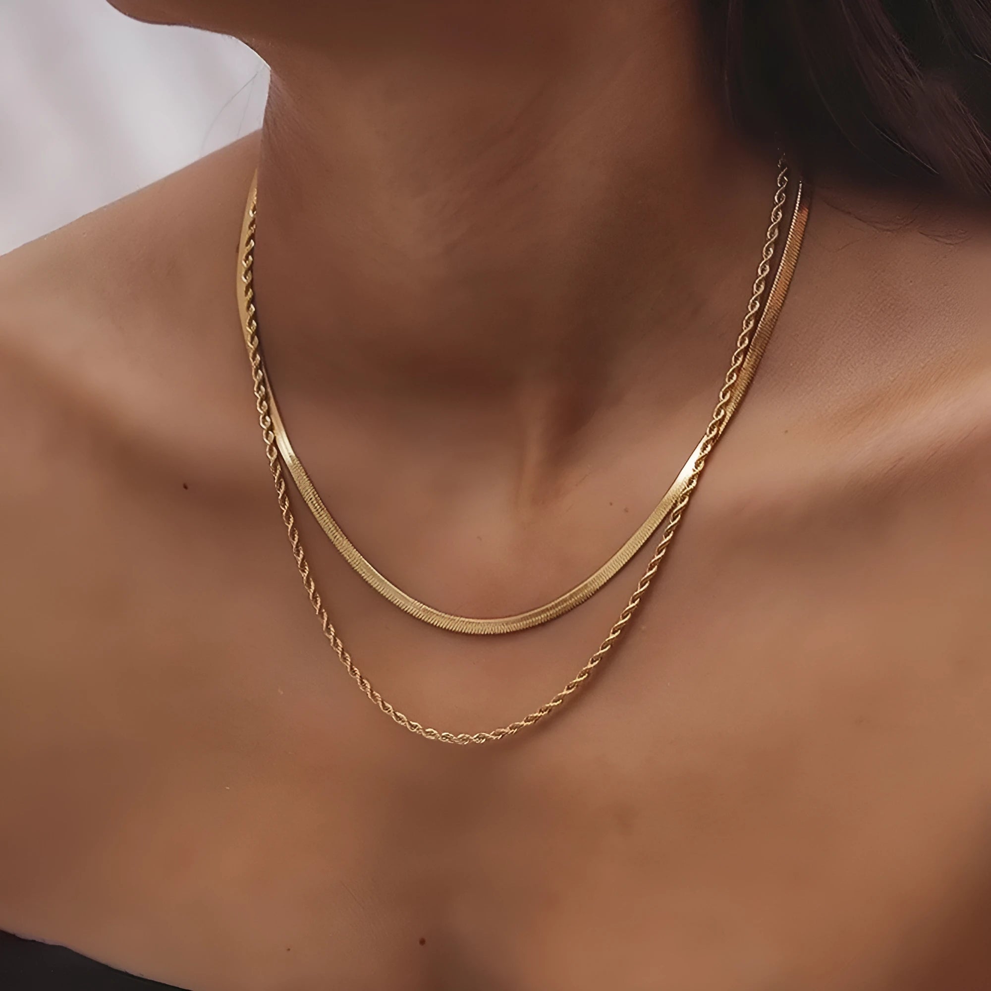 Women's retro geometric double-layer twist necklace with adjustable snake bones chain.