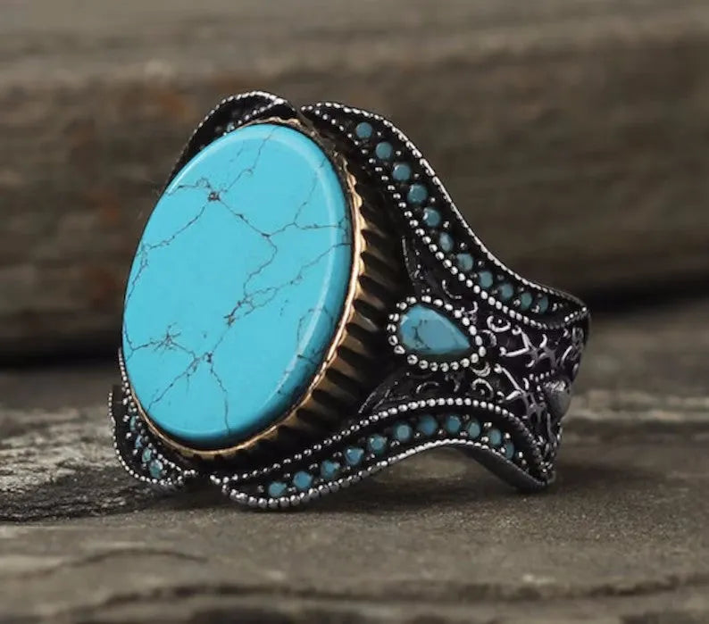 Men's antique silver alloy ring with turquoise stone in round band design