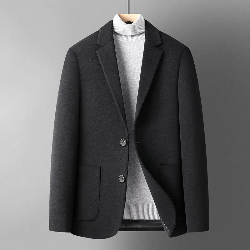 A grey slim-fit men's wool suit blazer with a non-ironing finish for autumn wear.