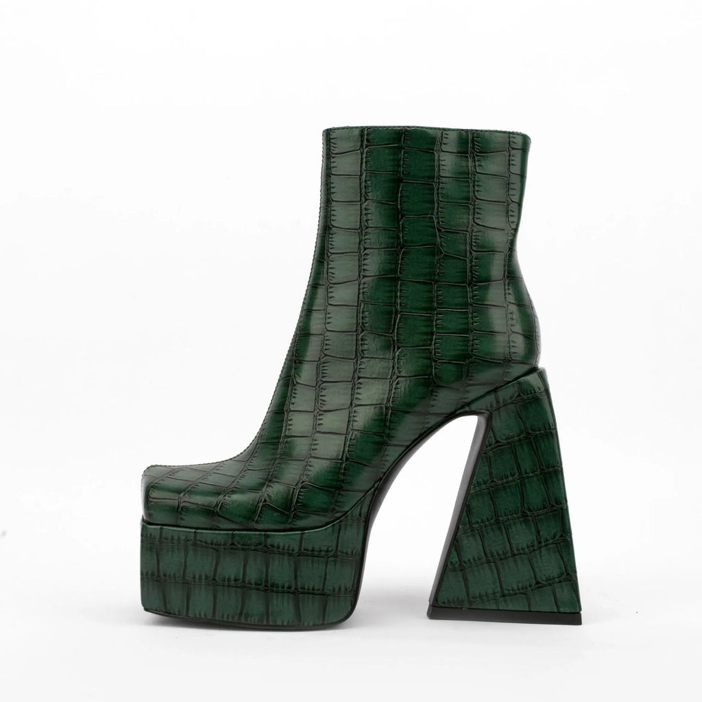 Women's ankle boots with a high heel in artificial PU leather, shown in beige colour.