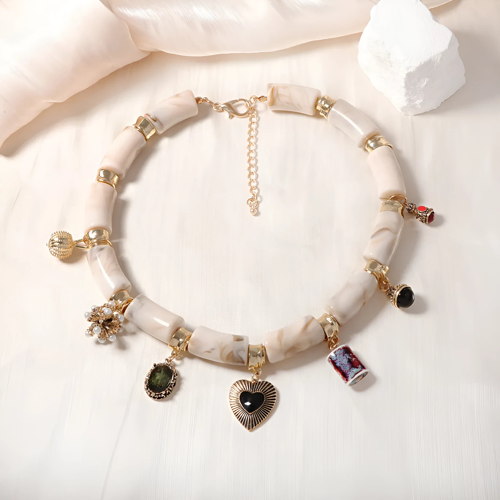 Green bamboo leaf heart-shaped resin pendant necklace with gold tone electroplated chain