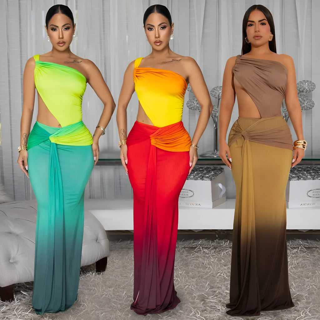 A woman's sleeveless cross-shoulder dress with a gradient colour long skirt.