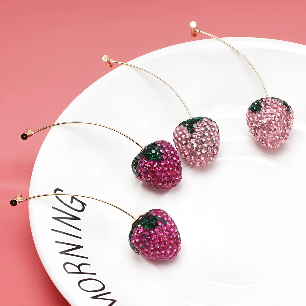 Red strawberry charm stud earrings with spot drill finish on zinc alloy.