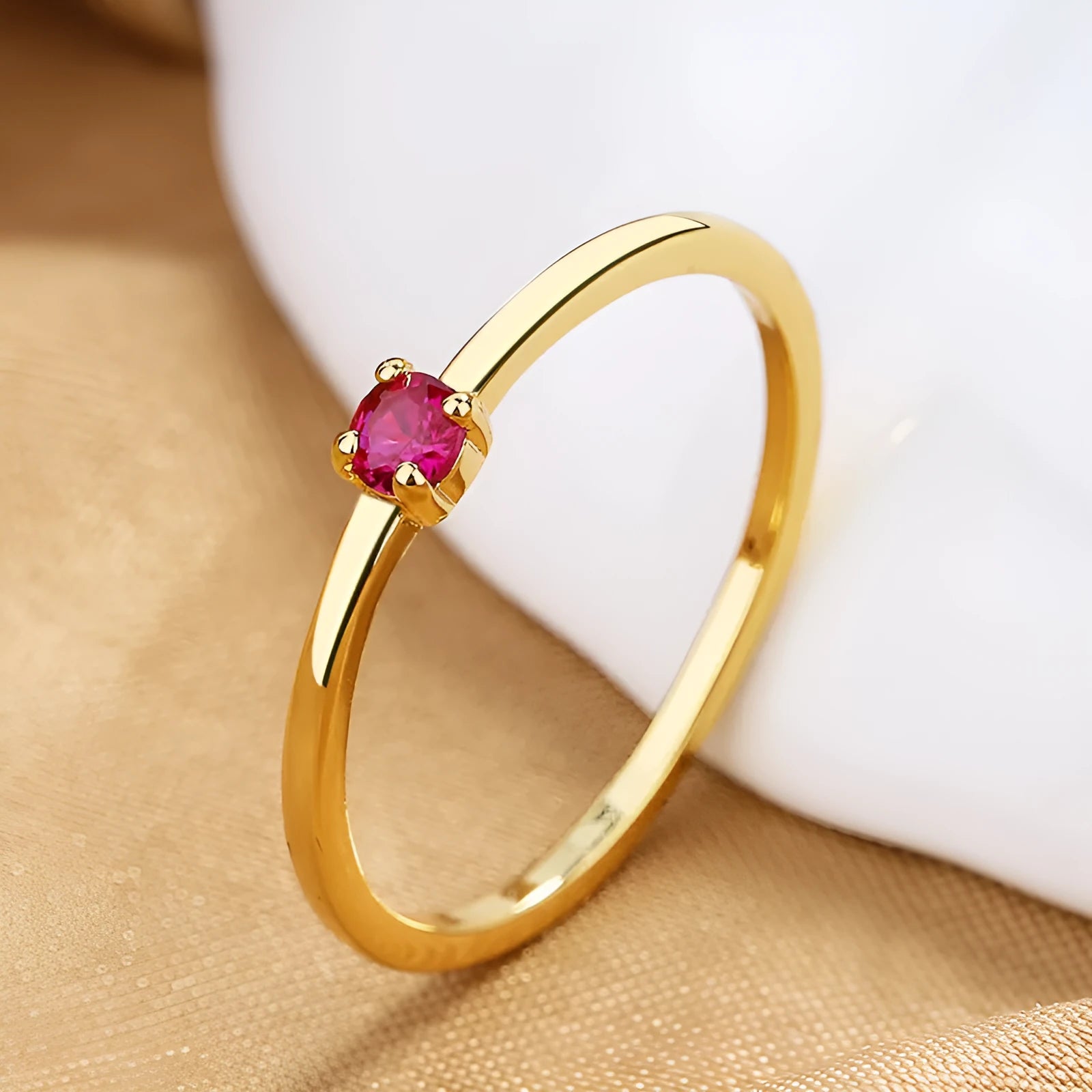 Women's geometric circle ring with single diamond in copper, showing colour options