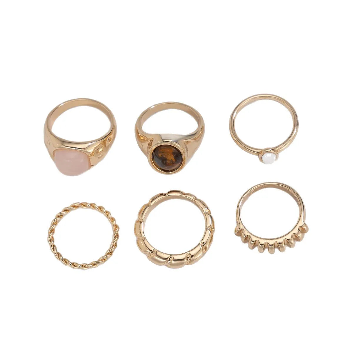 Set of six light gold geometric and round alloy rings with electroplated finish