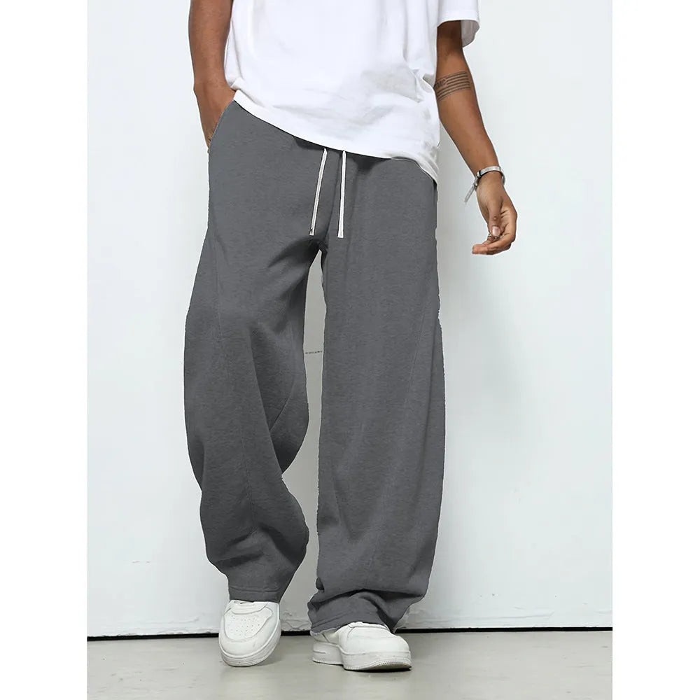 Men's straight-leg casual trousers in black with a drawstring waistband
