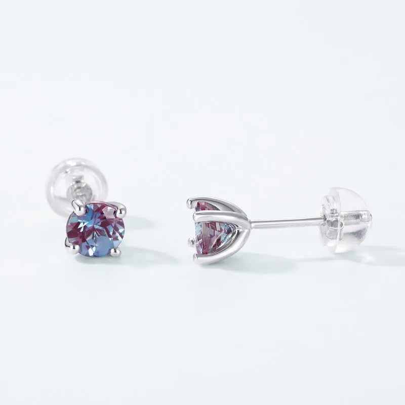 A pair of geometric 925 silver ear studs featuring a cultivated Alexandrite stone.
