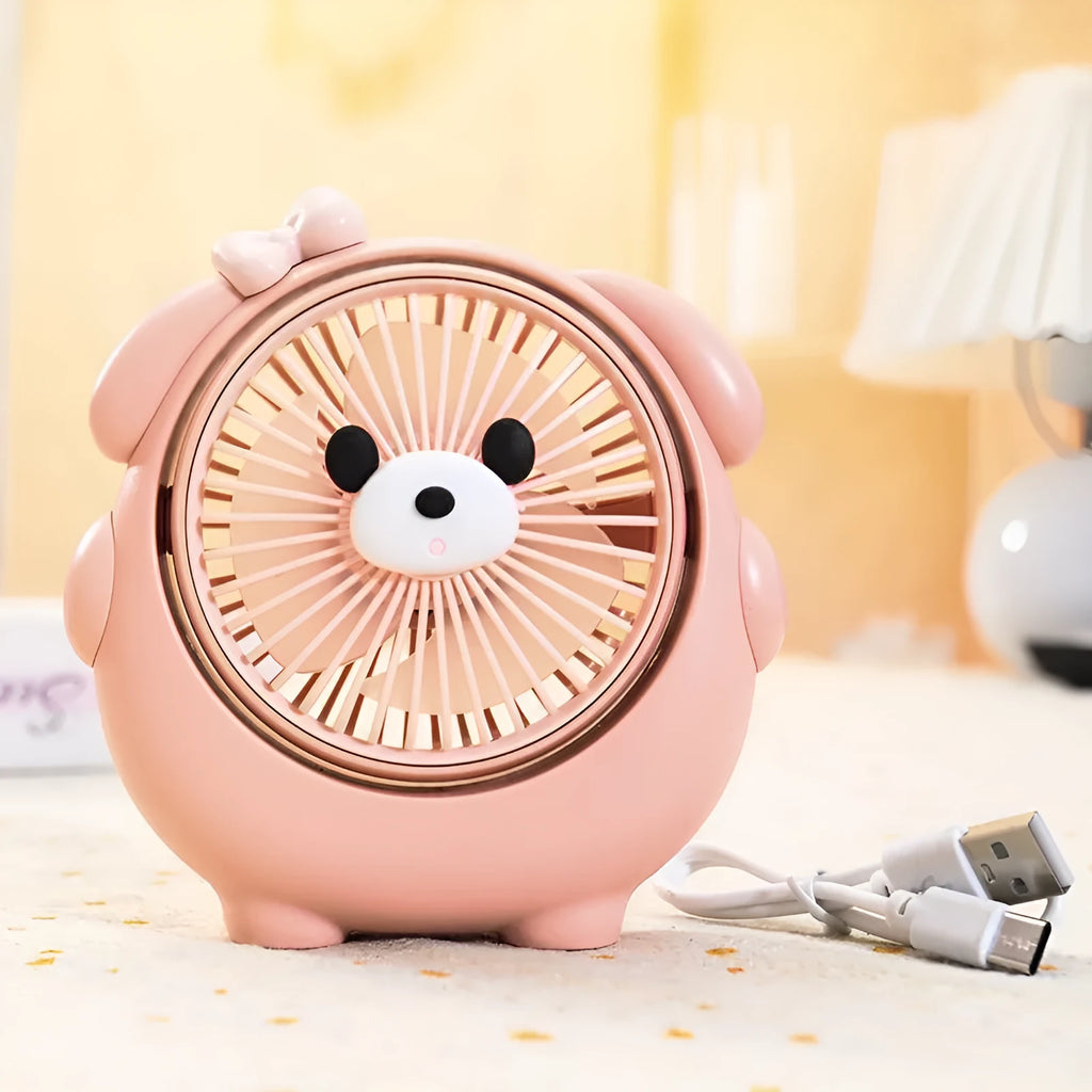Cute dog-themed USB desktop electric fan showing three-speed controls and plastic construction