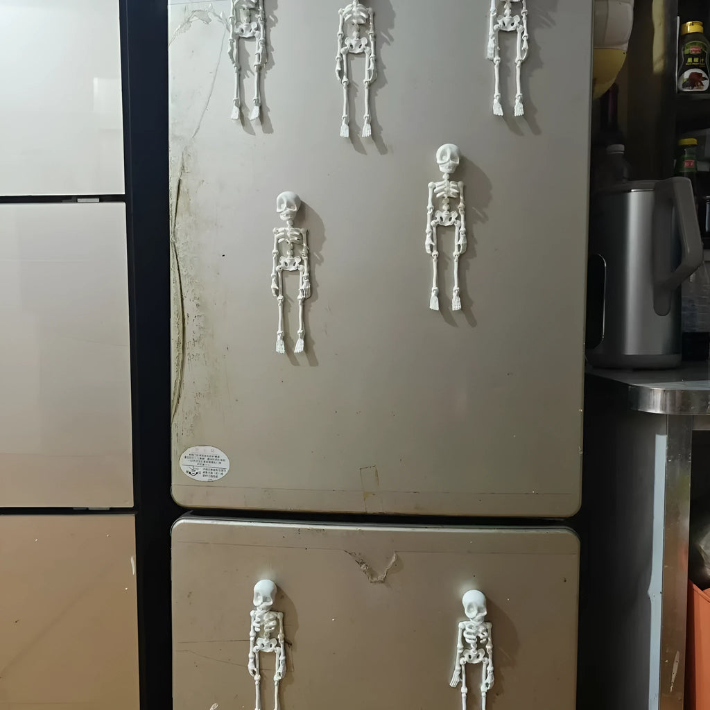 3D printed skull refrigerator magnet in multiple colours measuring 18cm high by 4.5cm wide