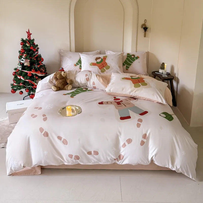 Cartoon printed Christmas bedding four-piece set including sheet, duvet cover and pillowcases.