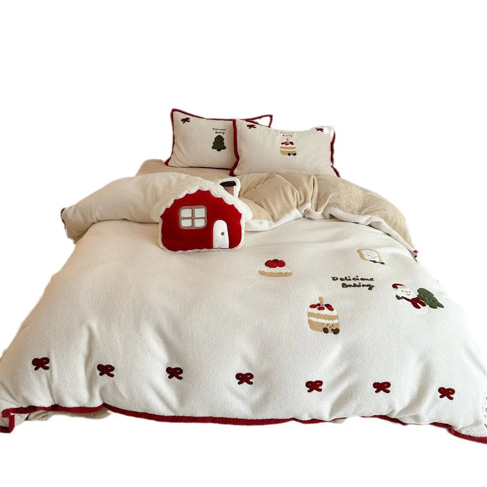 Winter Christmas cartoon cashmere bedding four-piece set shown on bed with duvet cover and pillowcases