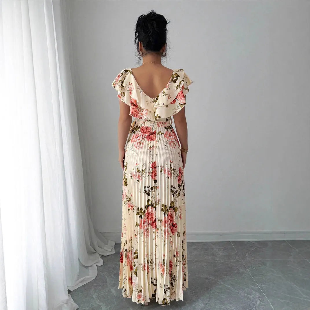 Apricot coloured V-neck dress with digital floral print, ruffled sleeves, and an oversized swing skirt.