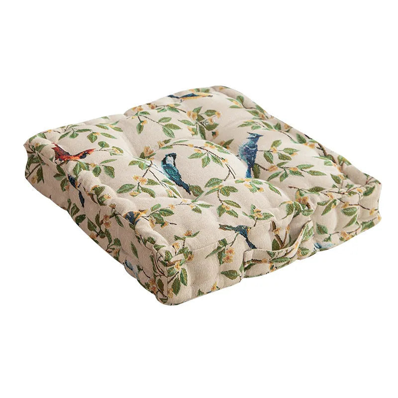 Square American-style dining chair cushion with pp cotton filler, shown in apricot floral bird print.