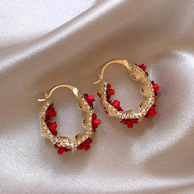 Red alloy flower clip earrings with rose design for women