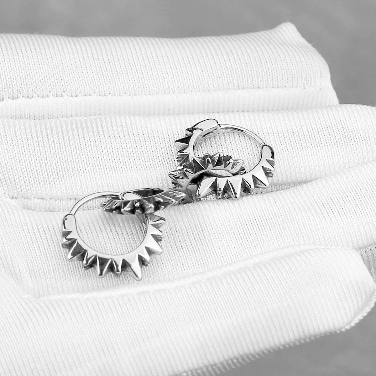 Retro style titanium steel round hoop earrings with polished stainless steel construction