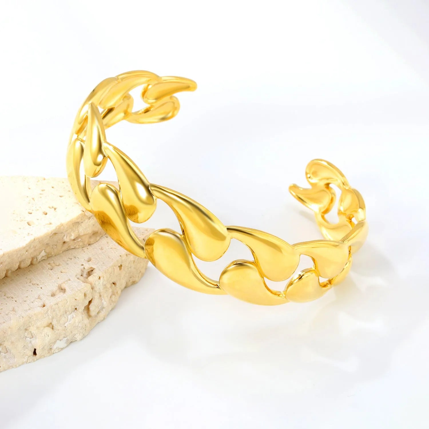 Stainless steel alloy bracelet in gold or silver tone for European American trend styling.