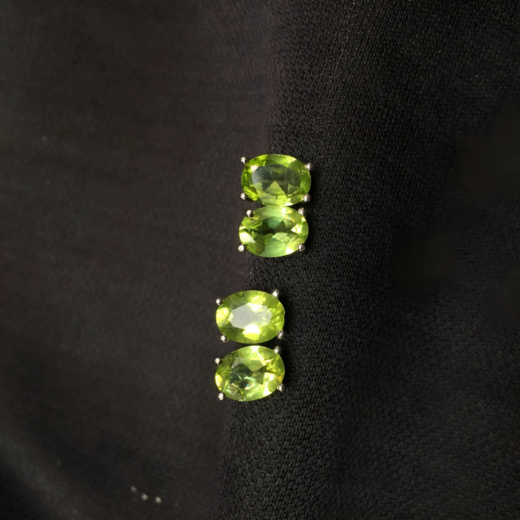 Natural grass green olivine stud earrings in S925 silver with 6x8mm geometric oval stones.