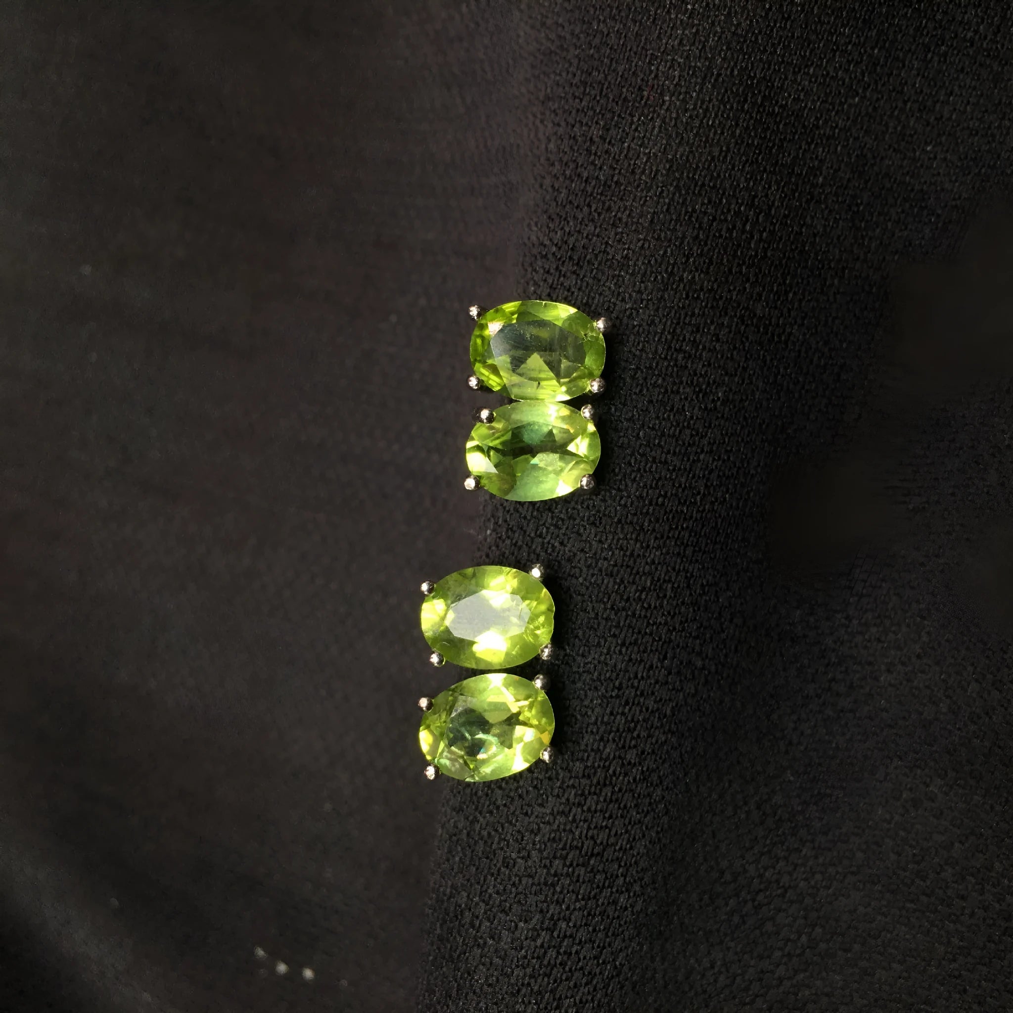 Natural grass green olivine stud earrings in S925 silver with 6x8mm geometric oval stones.
