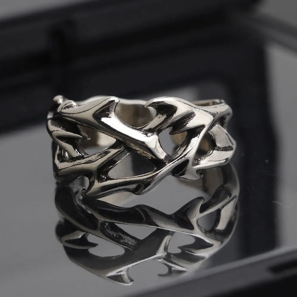 Copper geometric thorn flower ring with adjustable opening in colour J2150 thorns