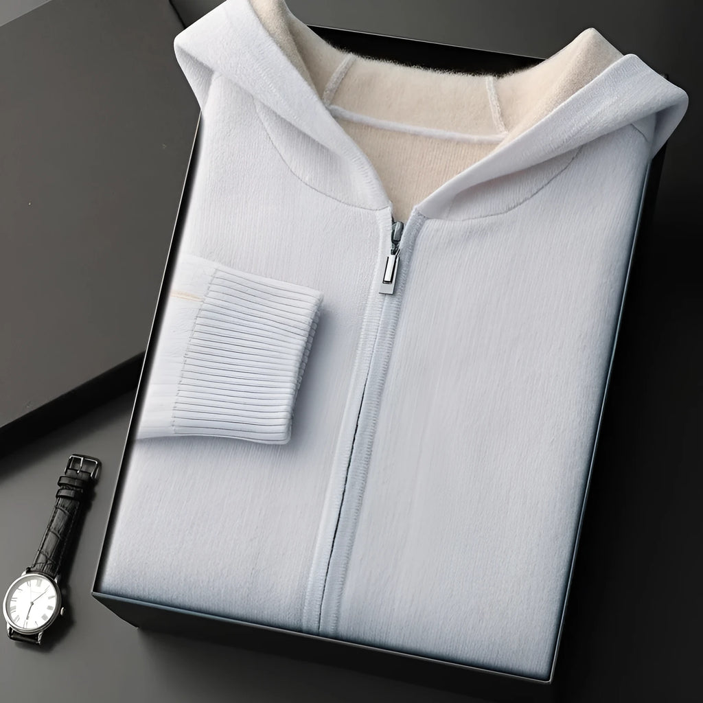 Dark blue men's loose-fit cashmere zip cardigan with a half-high collar, shown on a model.