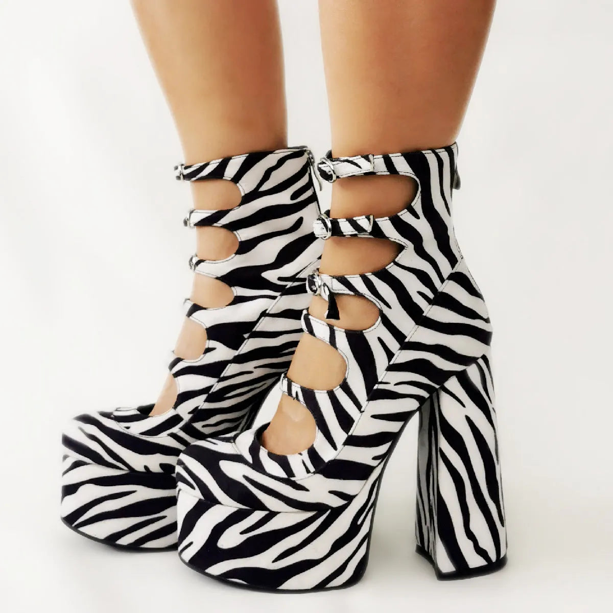 Women's black waterproof platform high heels with a thick heel, serpentine belt buckle, and patent leather upper.