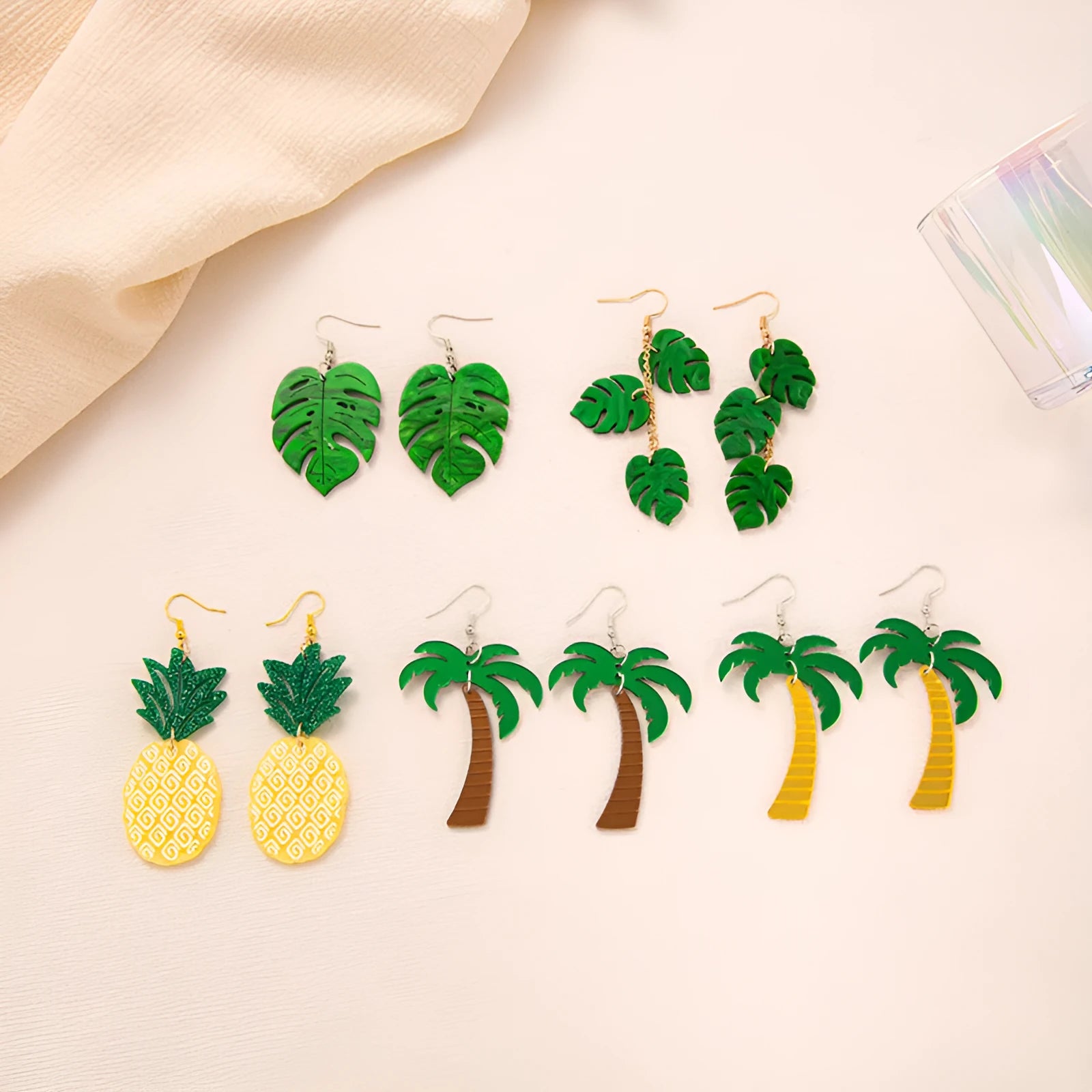 Jackfruit-shaped dangle earrings in acrylic and alloy, shown in one of five colour styles.