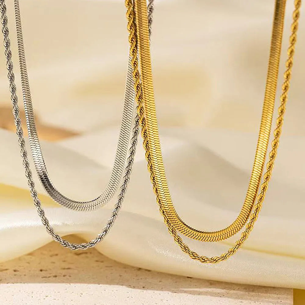 Women's retro geometric double-layer twist necklace with adjustable snake bones chain.
