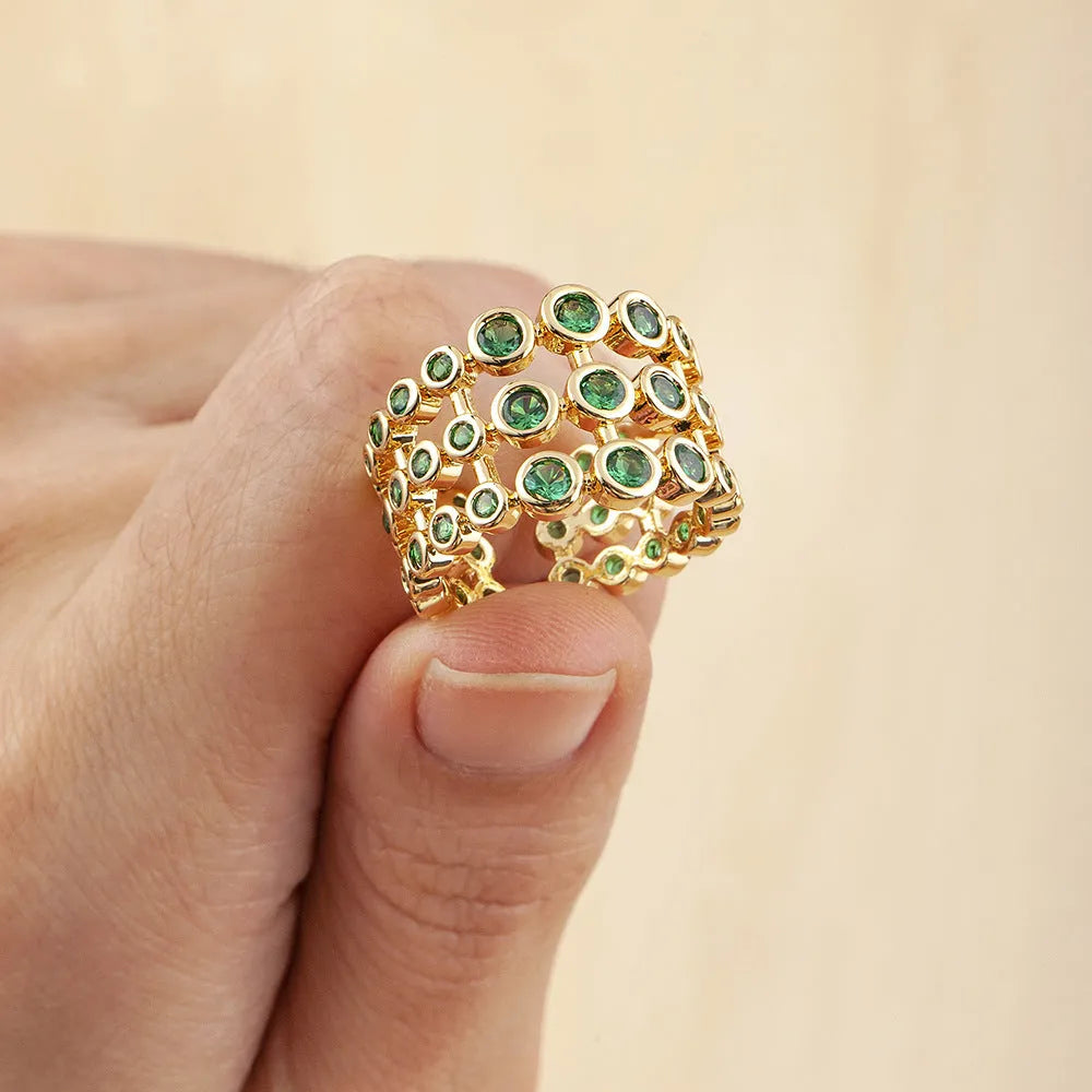 Wide band gold ring with three-layer green zircon stone setting on copper base