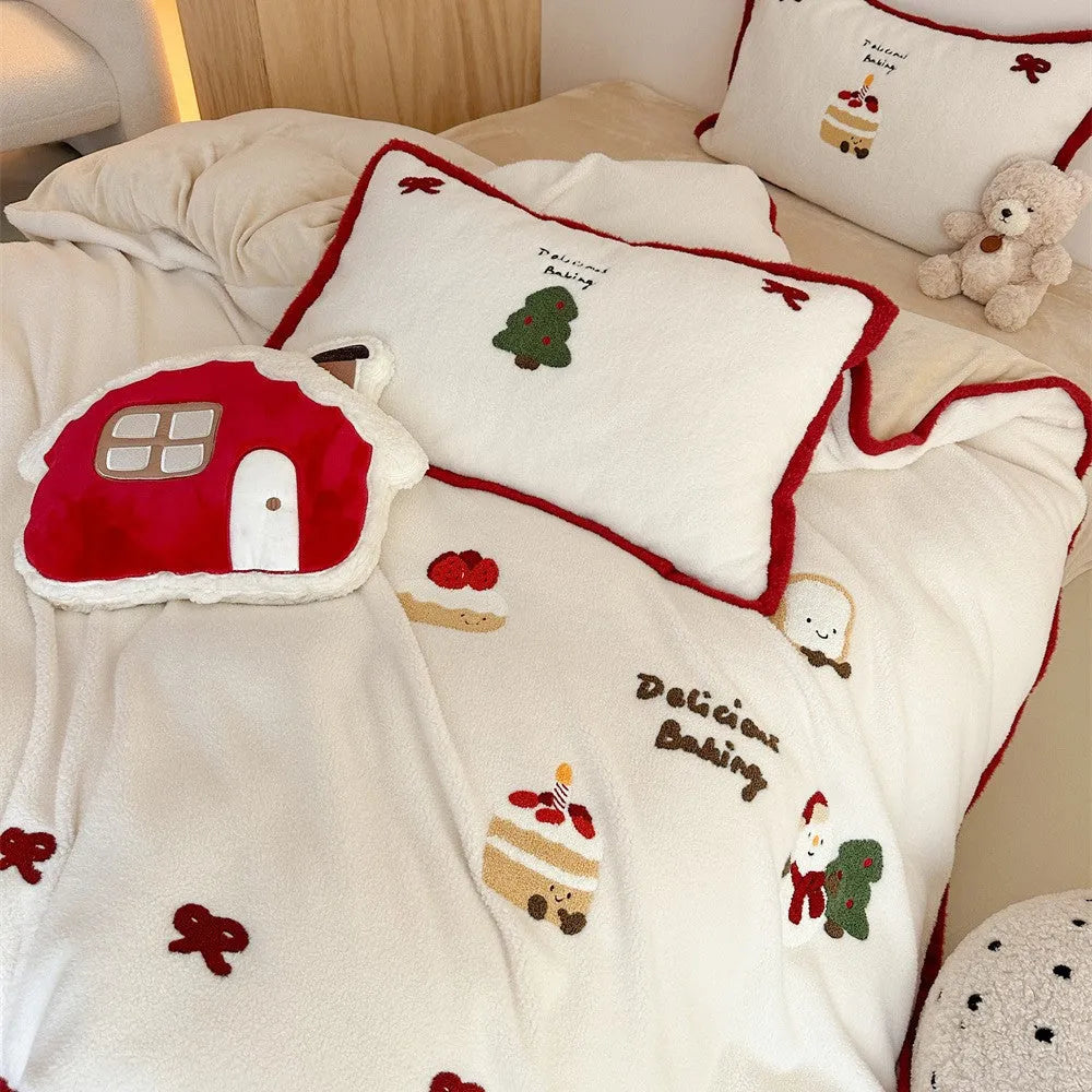 Winter Christmas cartoon cashmere bedding four-piece set shown on bed with duvet cover and pillowcases