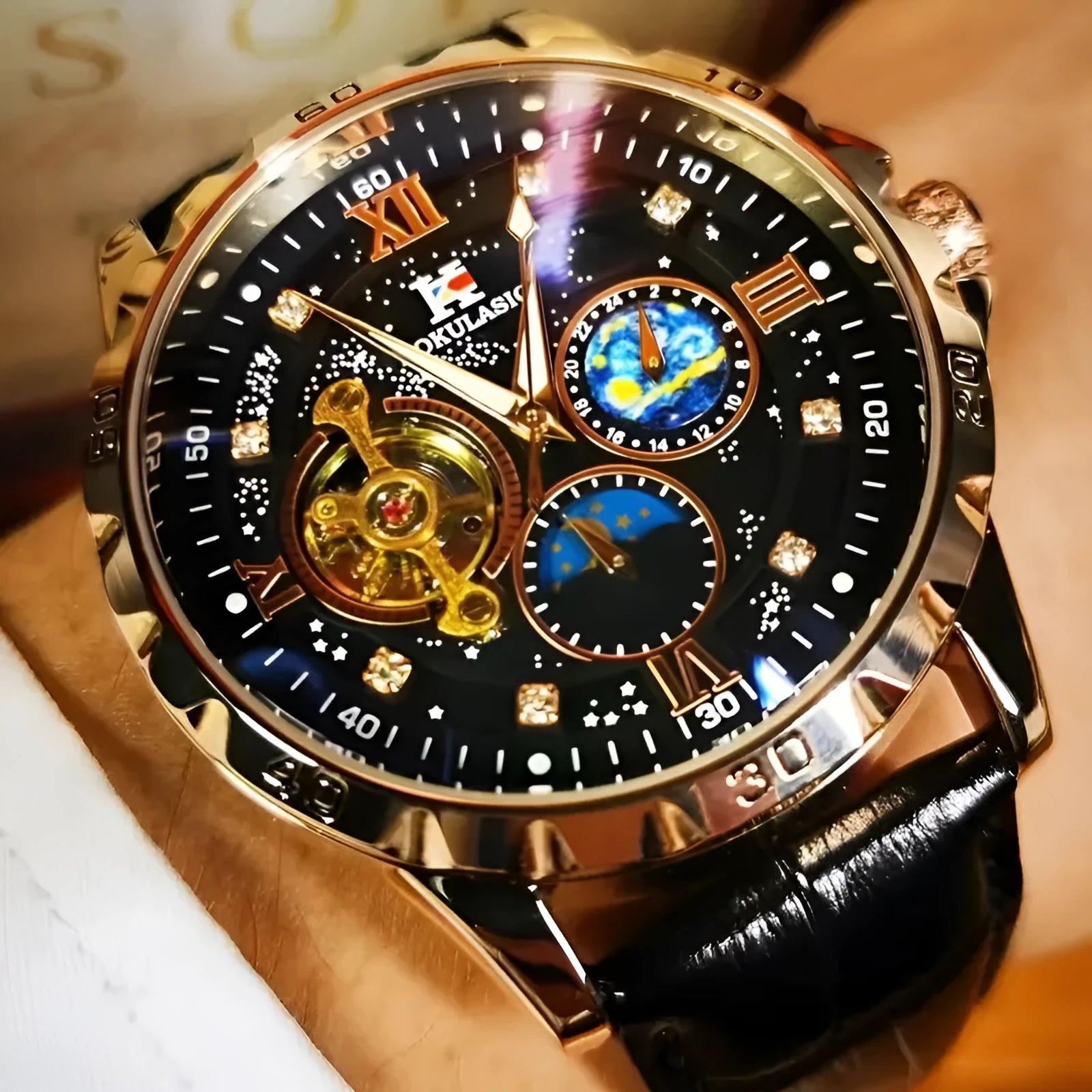 Men's black and rose gold automatic mechanical watch with large dial and leather strap.