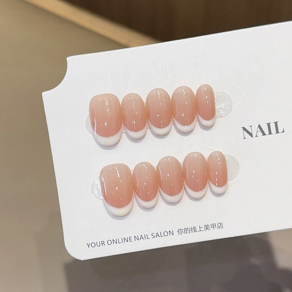 Baramine French style handmade nail tips in plaid pattern, short almond shape, plastic construction