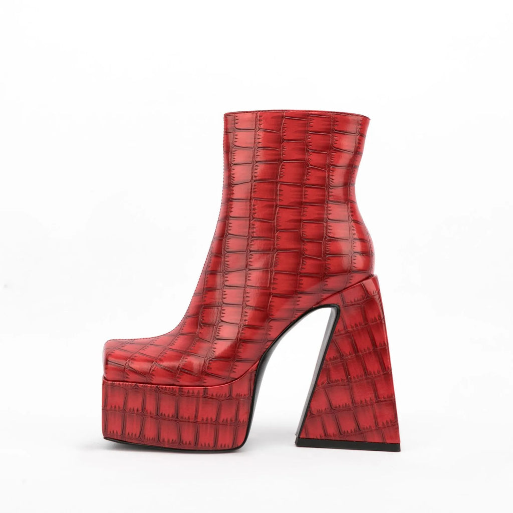 Women's ankle boots with a high heel in artificial PU leather, shown in beige colour.