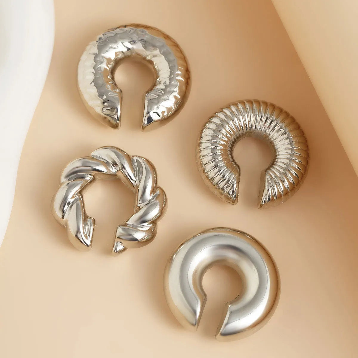 Geometric clip-on earrings set in gold and silver finishes for women without pierced ears