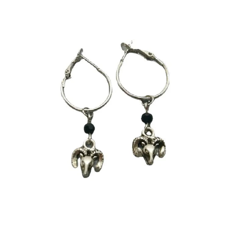 Silver round ring earrings for women with Tibetan antelope style design.